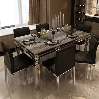 Mermer yemek masası ve sandalye kombinasyonu basit ev paslanmaz çelik dikdörtgen ışık abartılı tarzı yemek masası